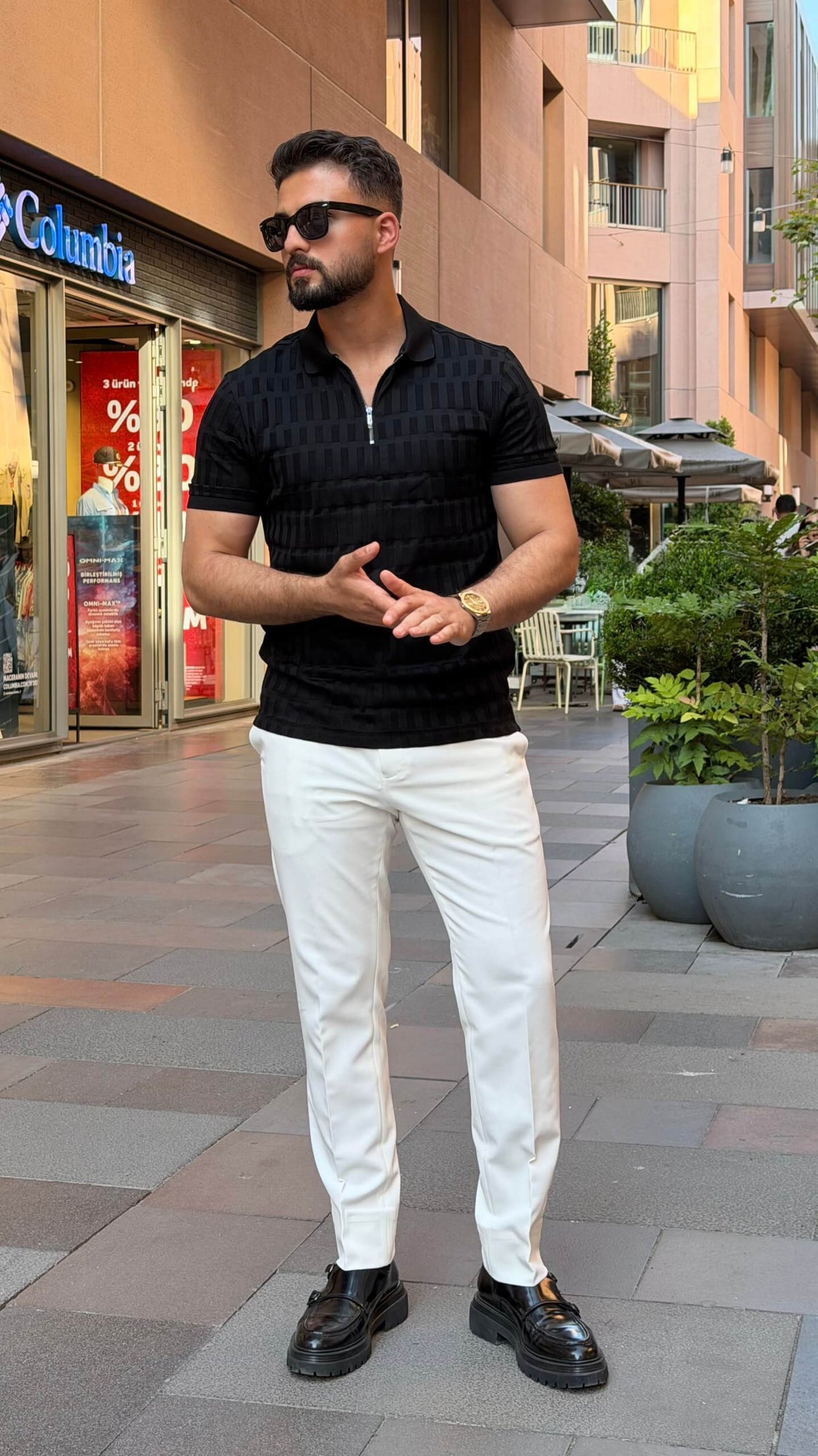 Men’s black textured pure cotton polo shirt with modern smart-casual style
