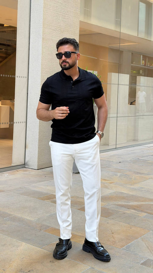 Men’s black knitted pure cotton polo shirt with textured smart-casual design