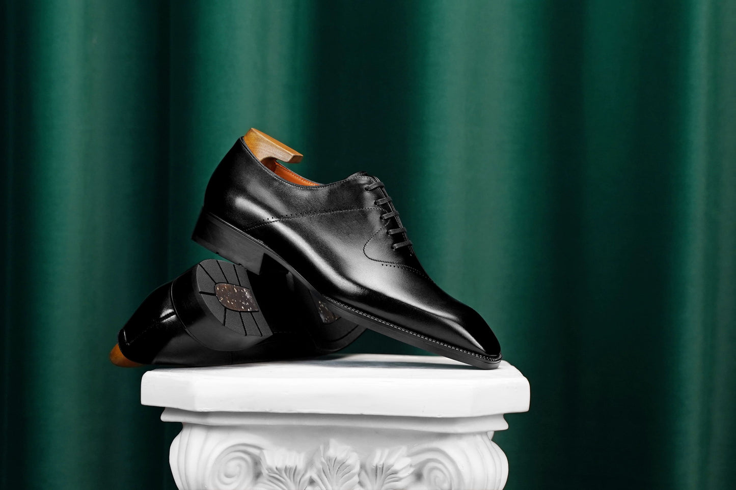 Men’s black leather cap toe Oxford dress shoes featuring a polished finish, lace-up closure, sleek tapered toe, and classic formal design.