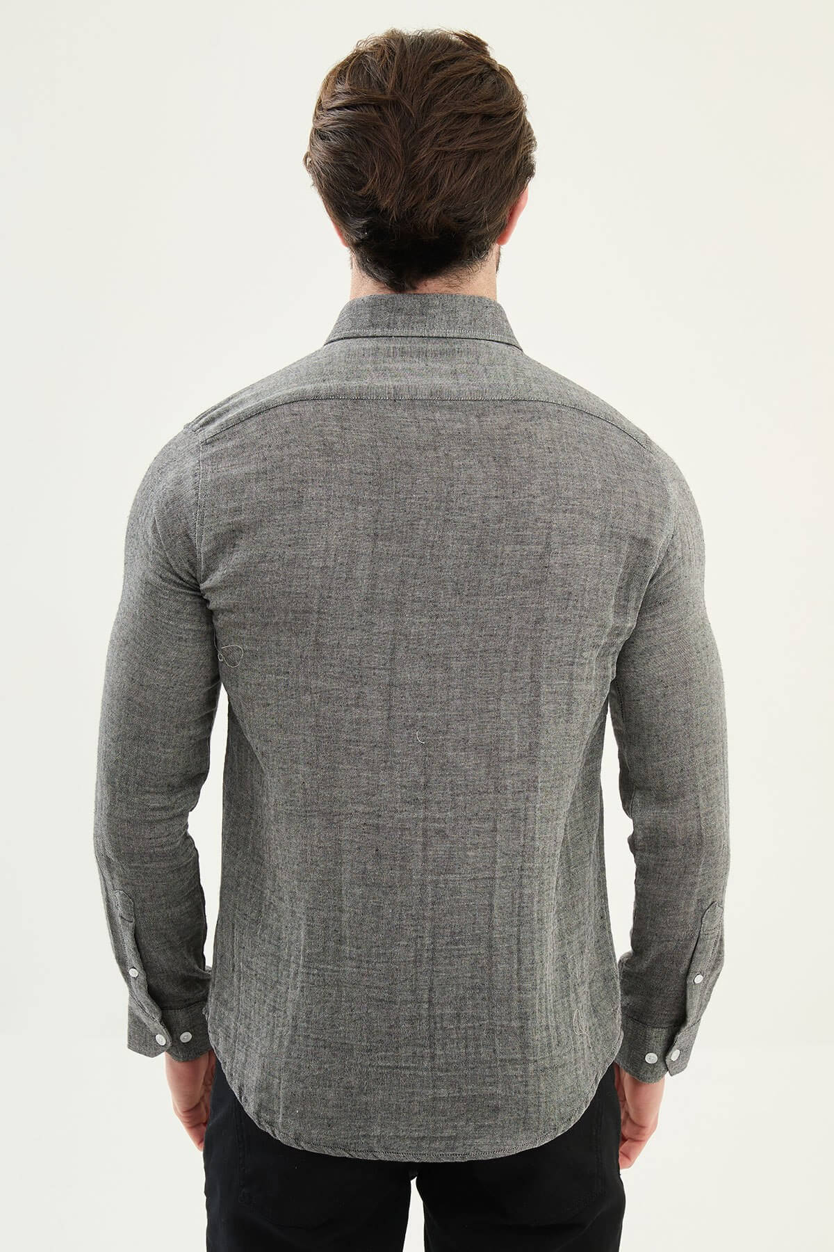 Men’s grey cotton long sleeve button-down shirt with a lightweight textured finish, styled for smart casual spring and summer outfits.