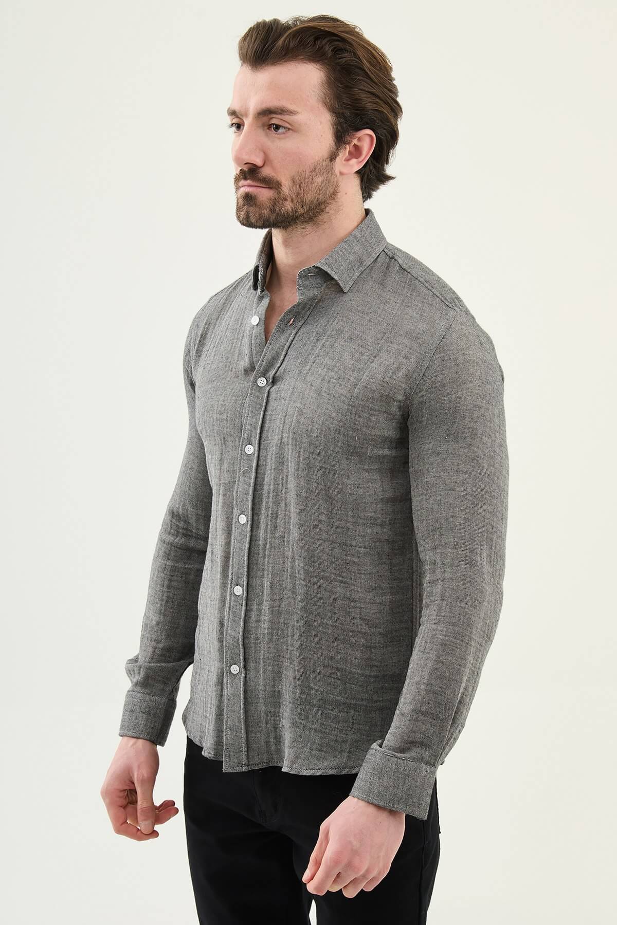 Men’s grey cotton long sleeve button-down shirt with a lightweight textured finish, styled for smart casual spring and summer outfits.