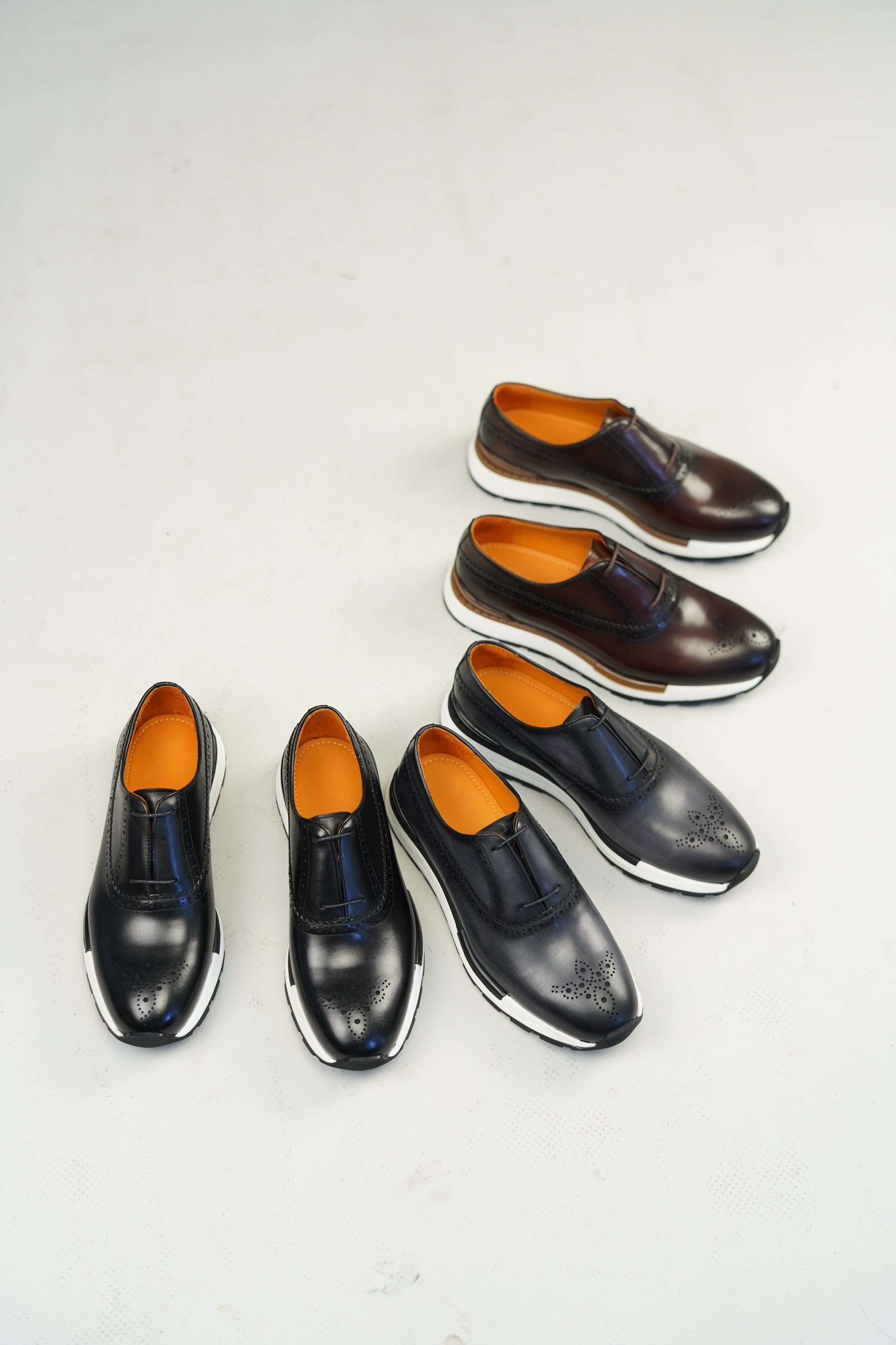 Black leather minimal lace brogue sneakers for men