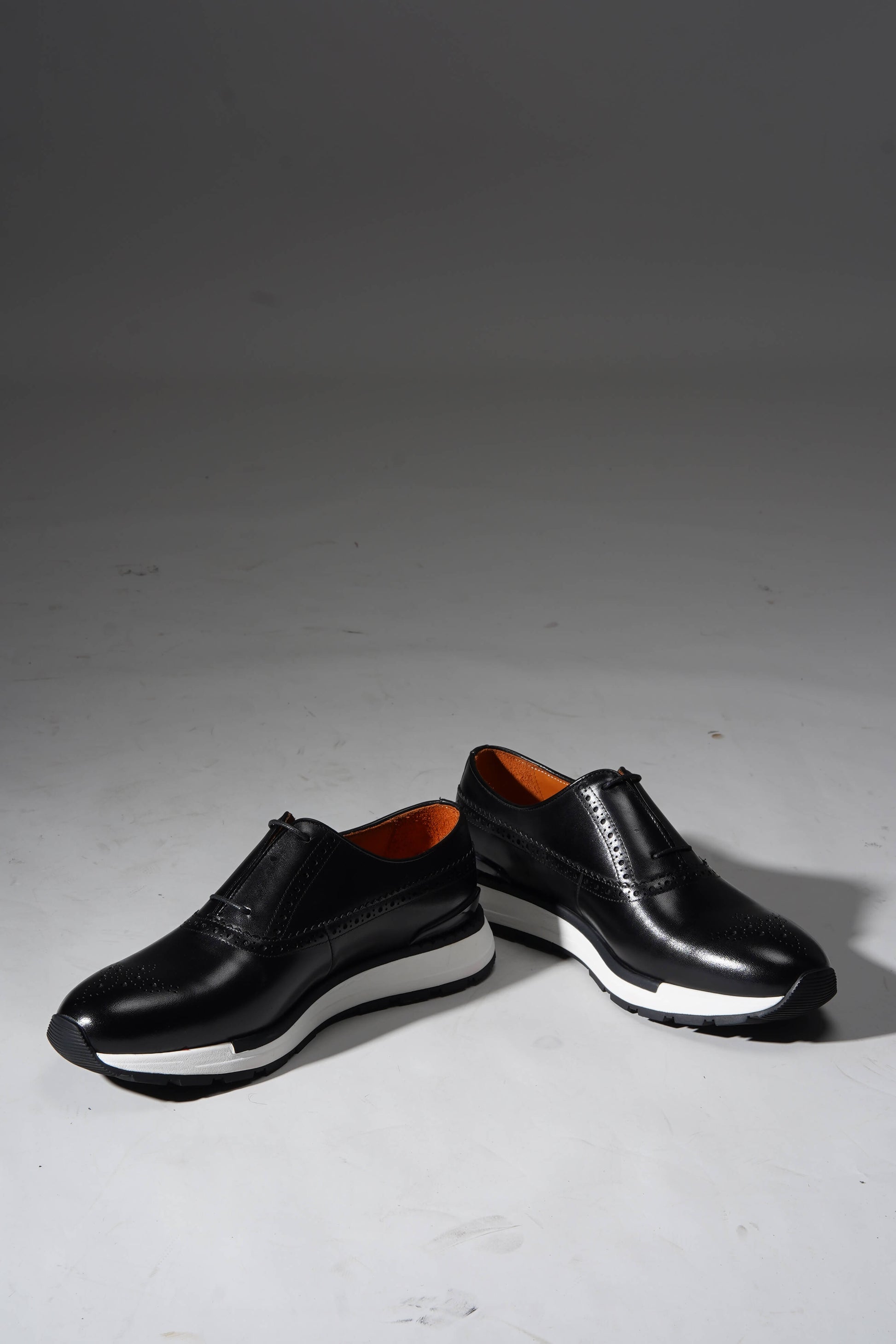 Black leather minimal lace brogue sneakers for men