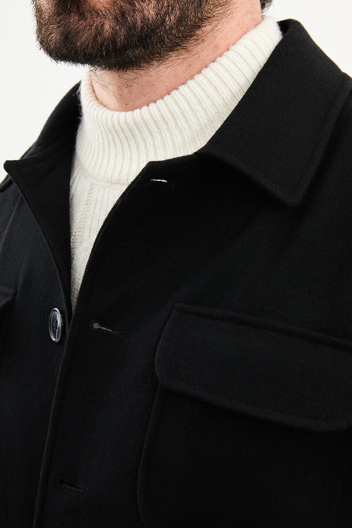 Men’s black wool blend utility jacket with button-up front and four pockets, regular fit smart casual layering jacket styled with black trousers and turtleneck sweater