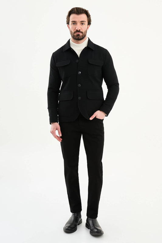 Men’s black wool blend utility jacket with button-up front and four pockets, regular fit smart casual layering jacket styled with black trousers and turtleneck sweater