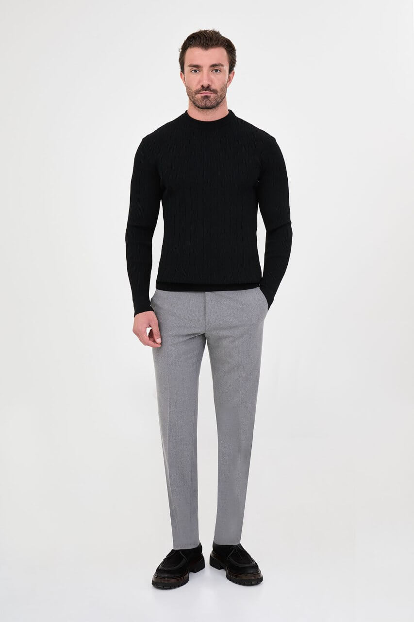 Men's black textured crew neck knit sweater for fall winter menswear.