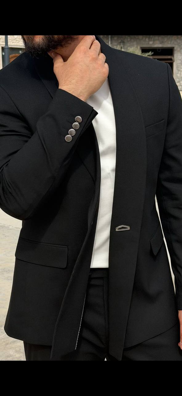 Black double-breasted shawl lapel slim-fit men’s suit worn with black slim trousers, perfect for formal events and weddings.