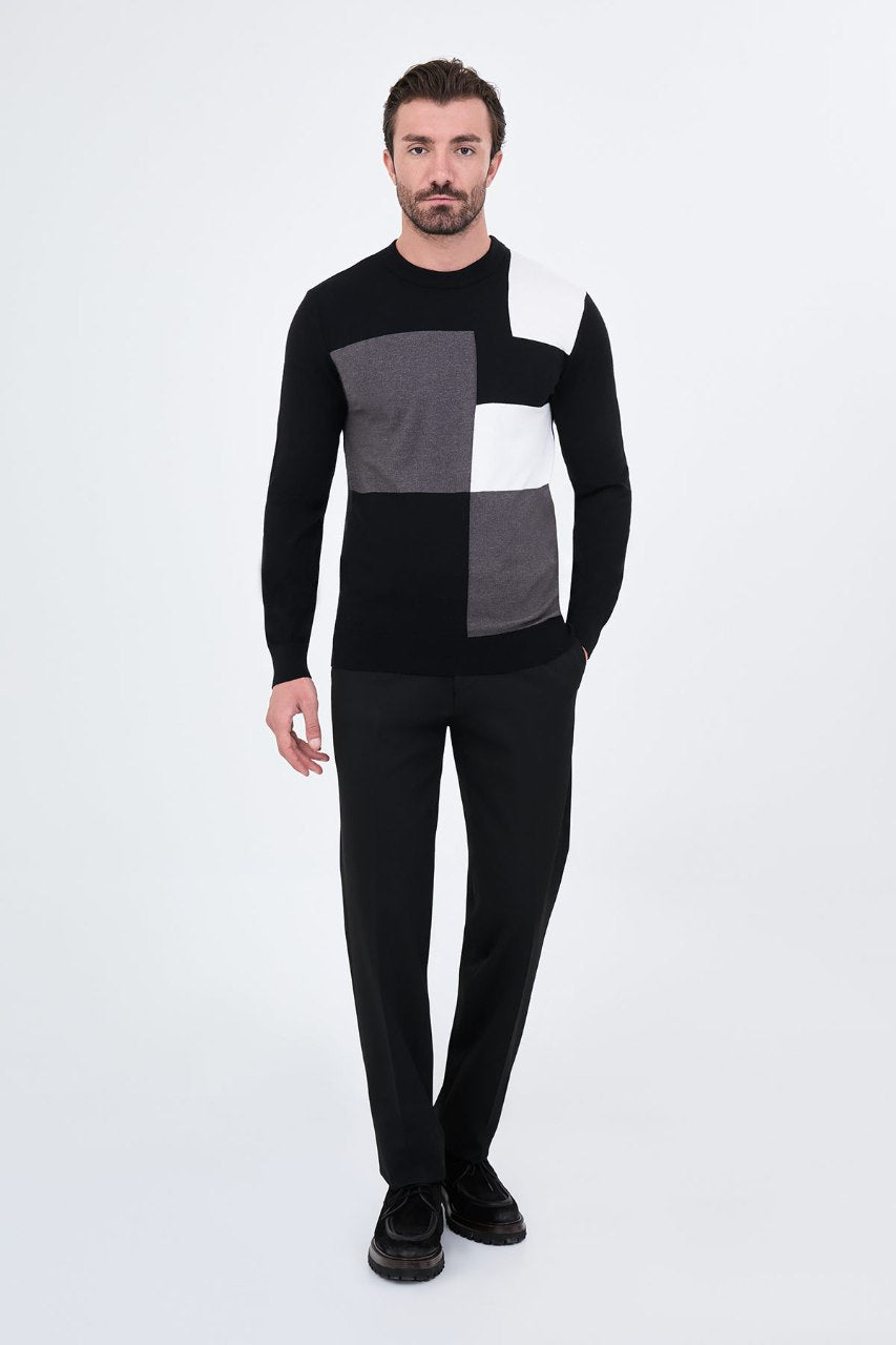 Men's black crew neck sweater with grey and white geometric colour-block panels.