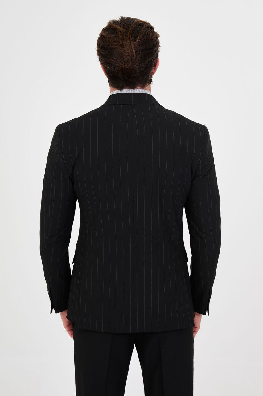 HolloMen men's black pinstripe double-breasted suit with peak lapels, six-button jacket, flap pockets, and patterned pocket square.