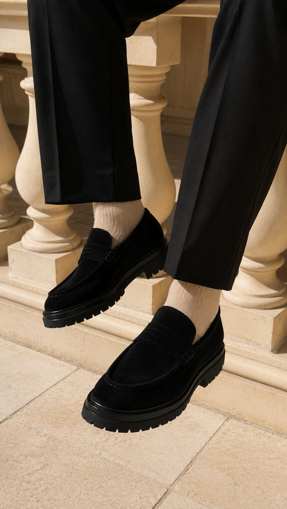Men's black suede loafer, slip-on style, side view