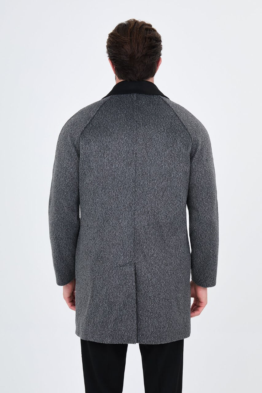 Men's dark grey wool overcoat with stand collar, button-front fastening, and tailored silhouette.