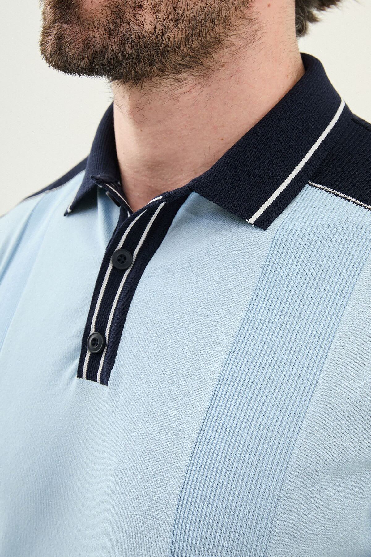 Men’s blue slim-fit knit polo shirt with classic collar, short sleeves, and textured knit finish for summer smart-casual style.