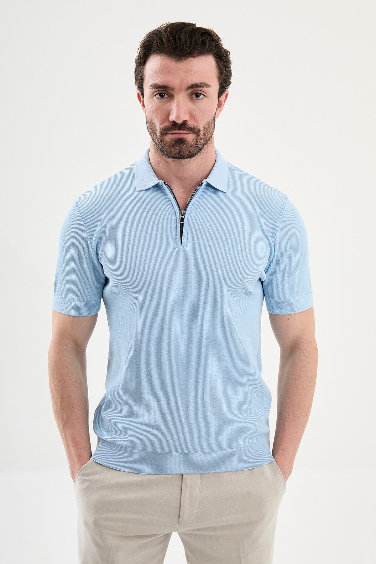 Men’s blue slim-fit knit polo shirt with classic collar, short sleeves, and textured knit finish for summer smart-casual style.