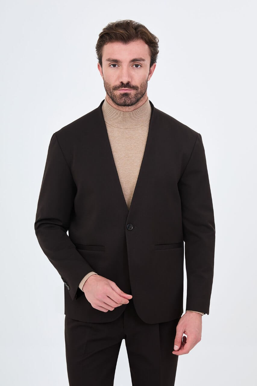 Men's brown slim-fit suit featuring a collarless V-neck jacket and single-button fastening.