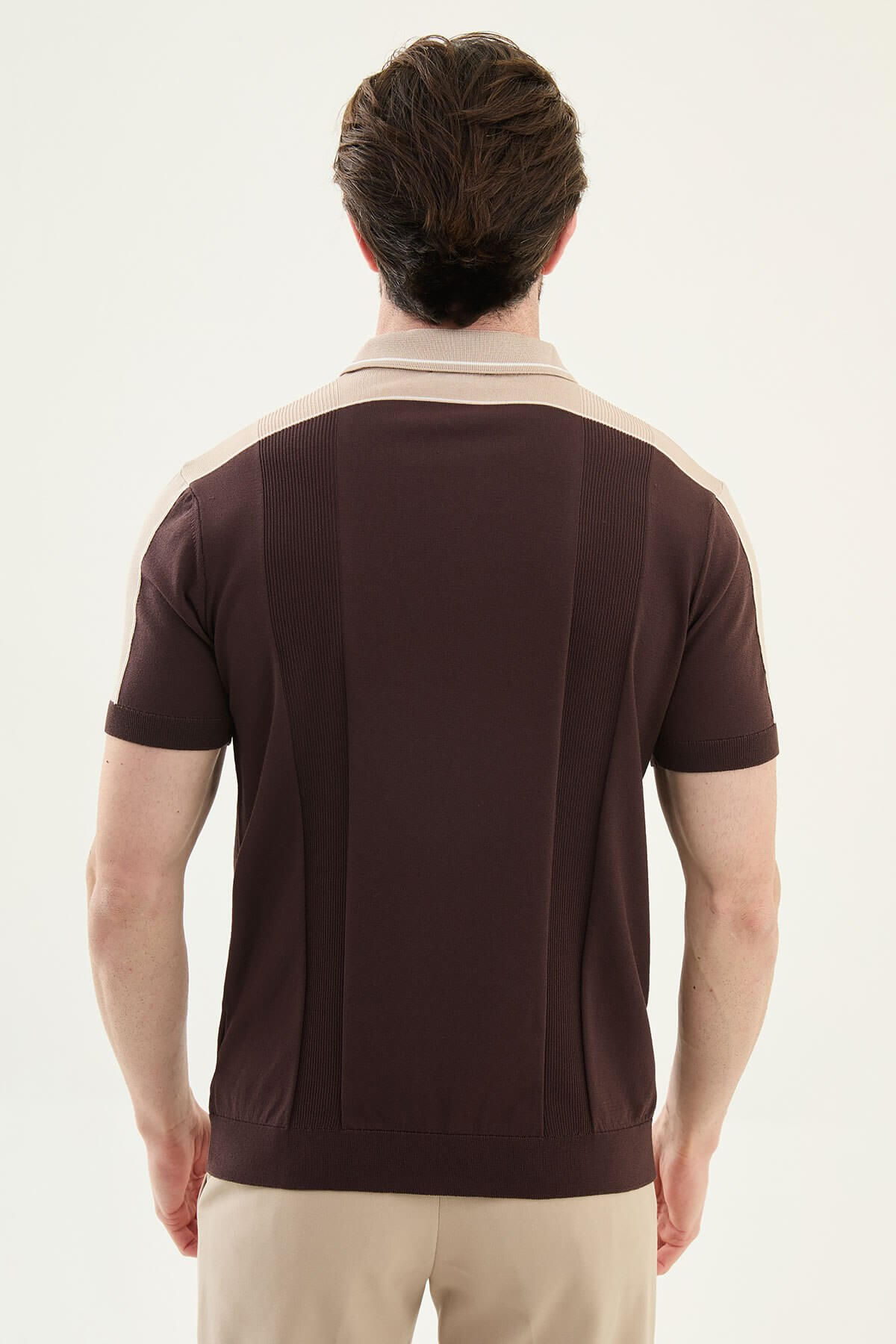 Men’s brown slim-fit knit polo shirt with classic collar, short sleeves, and textured knit finish for summer smart-casual style.