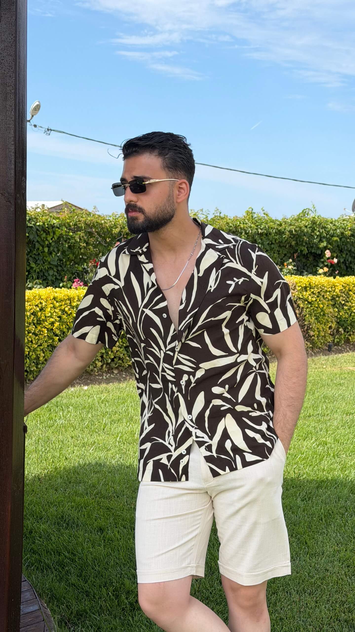 Men’s brown beige floral print short sleeve shirt with lightweight viscose fabric, button-front design, and summer casual style.