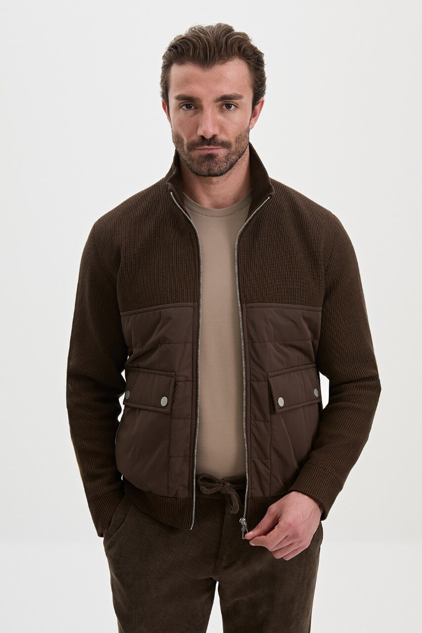 Brown men's casual jacket styled with a neutral top and dark trousers.