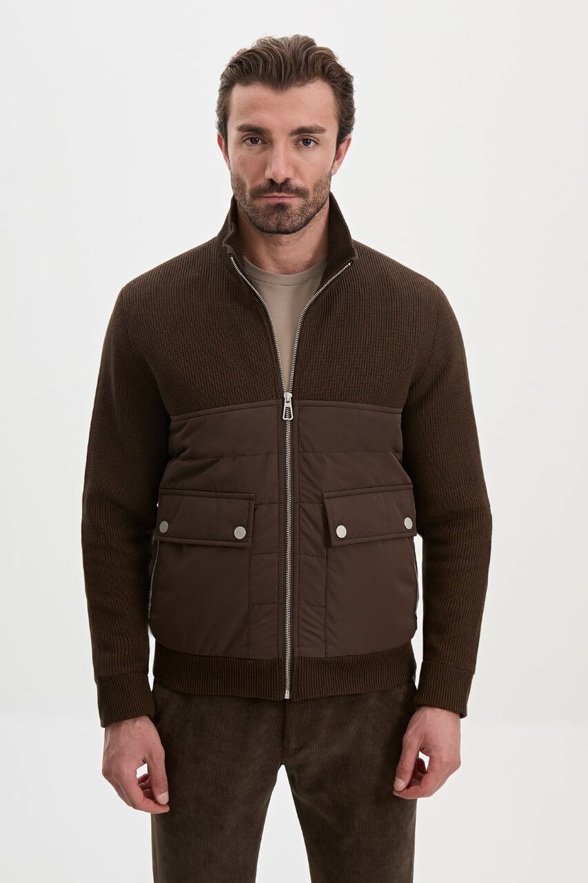 Brown men's casual jacket styled with a neutral top and dark trousers.