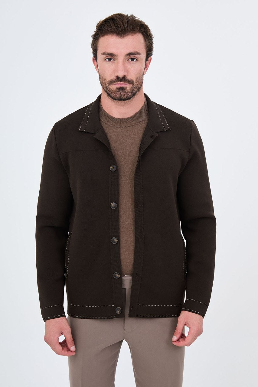 Men’s brown cotton blend knit button-up cardigan styled with trousers for fall winter fashion