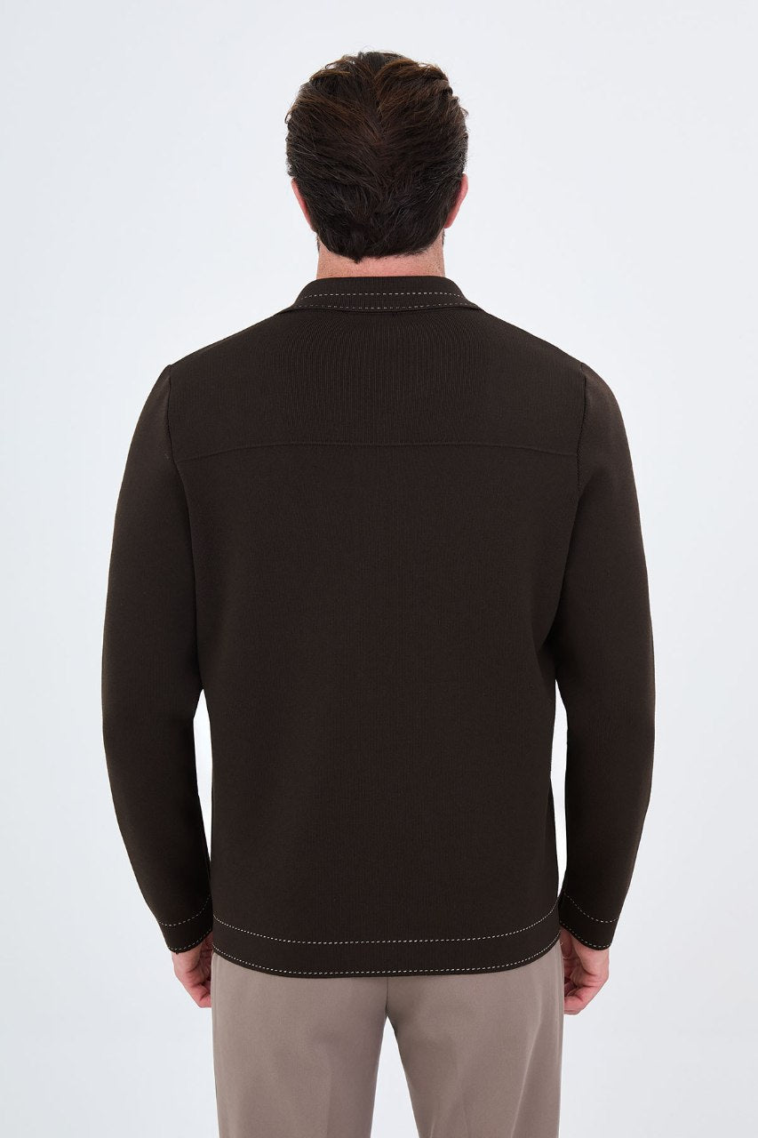 Men’s brown cotton blend knit button-up cardigan styled with trousers for fall winter fashion