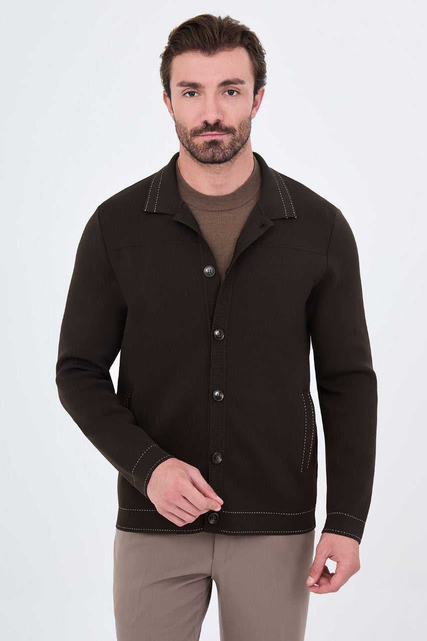 Men’s brown cotton blend knit button-up cardigan styled with trousers for fall winter fashion