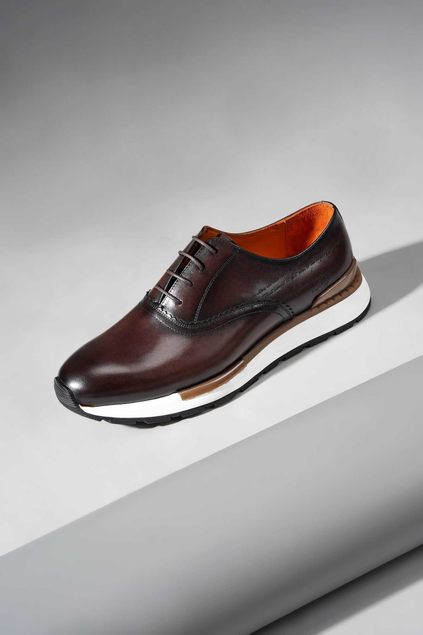 Luxury brown leather sneakers for men with premium design