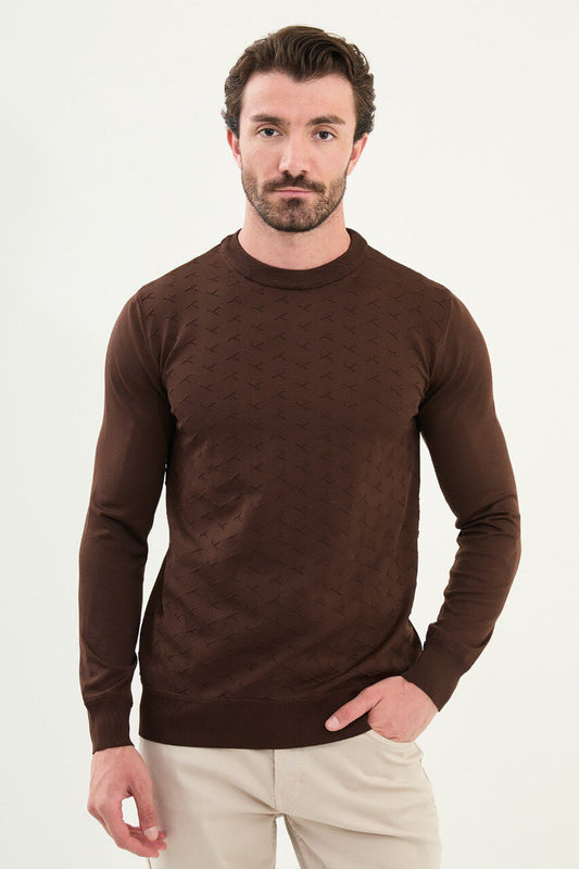 Men’s slim-fit chocolate brown crew-neck sweater with geometric ‘T’ textured knit front panel, cotton-viscose-elastane blend, styled with cream trousers.