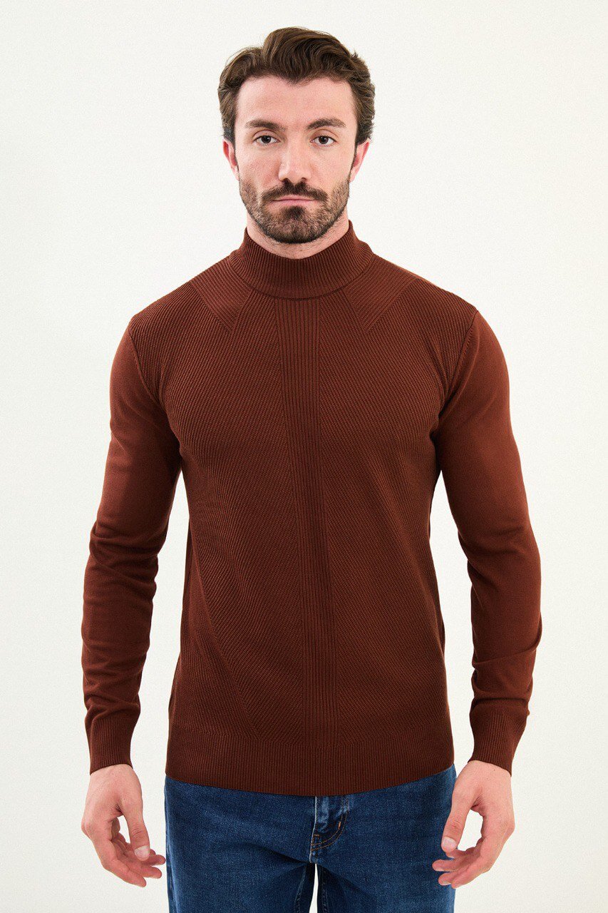 Men’s tile (terracotta) slim-fit ribbed mock-neck cotton-blend sweater with multi-directional ribbing and diagonal chest panels, styled with blue denim.