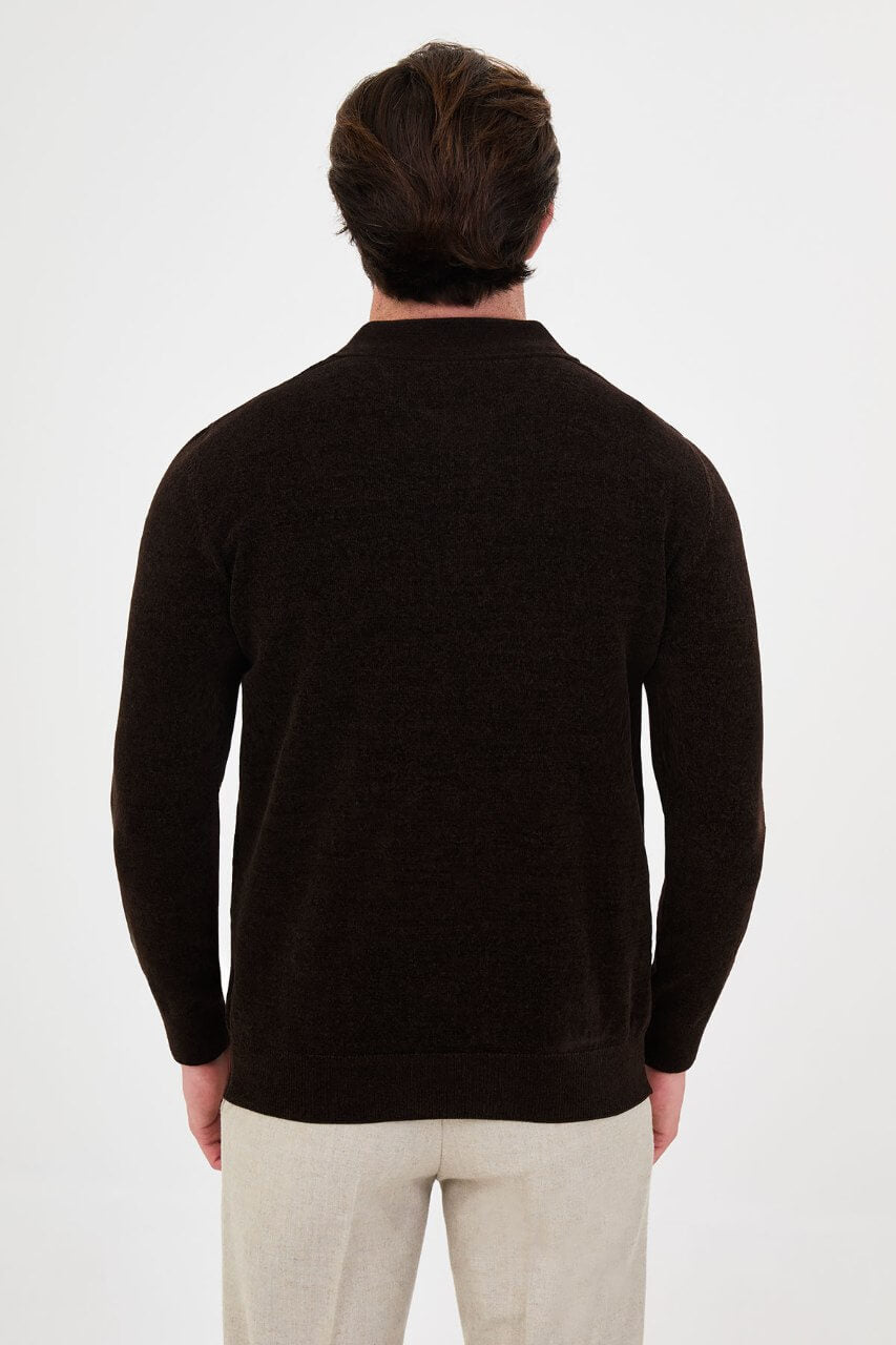 Men’s brown polo neck knit sweater with zip collar detail styled with cream trousers for a smart casual fall winter outfit.