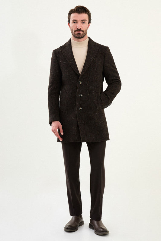 Brown wool blend tailored coat styled with beige turtleneck sweater. 