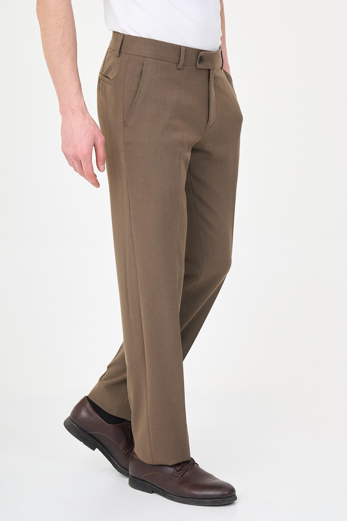 Brown slim-fit formal trousers with front pleats, styled with brown leather shoes, perfect for summer business and semi-formal occasions.