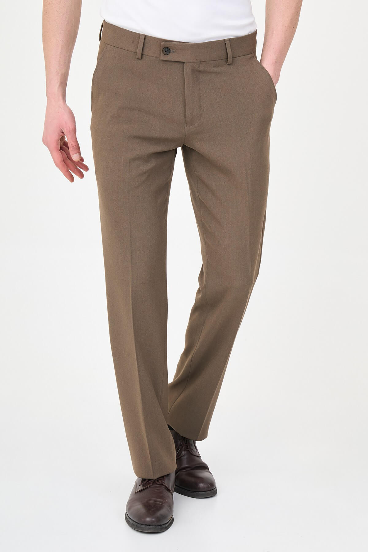 Brown slim-fit formal trousers with front pleats, styled with brown leather shoes, perfect for summer business and semi-formal occasions.