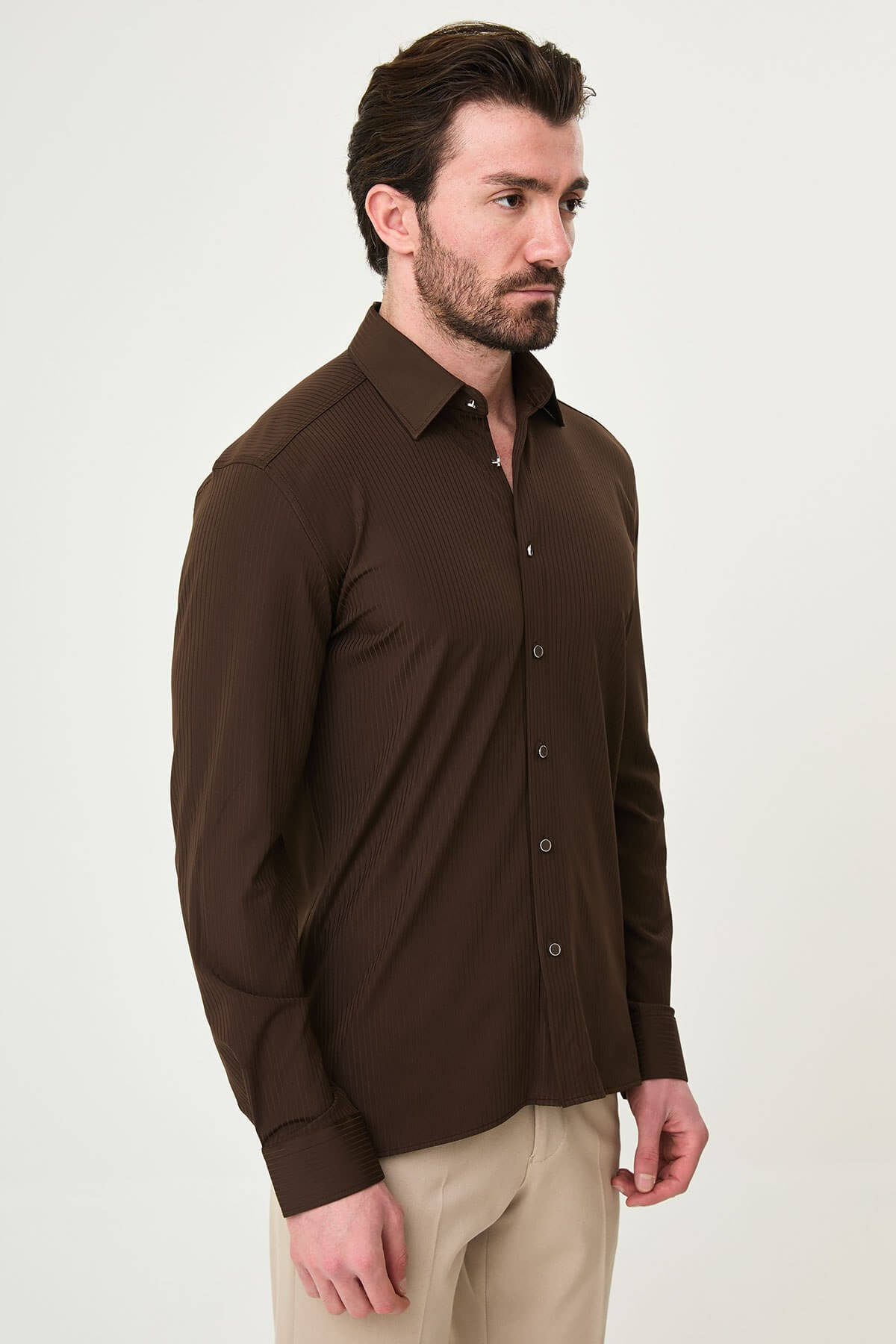 Brown striped slim-fit long sleeve men’s shirt with contrast pocket detail, perfect for summer smart-casual outfits