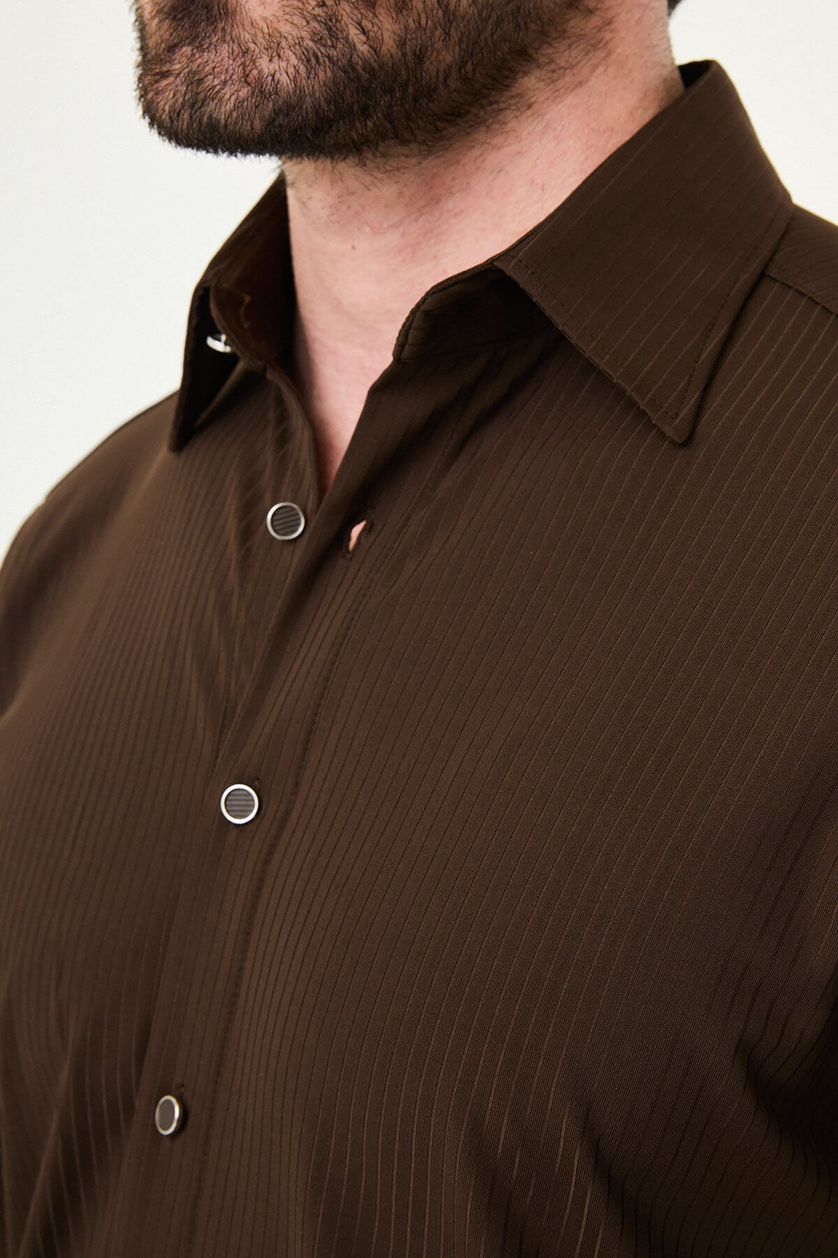 Brown striped slim-fit long sleeve men’s shirt with contrast pocket detail, perfect for summer smart-casual outfits