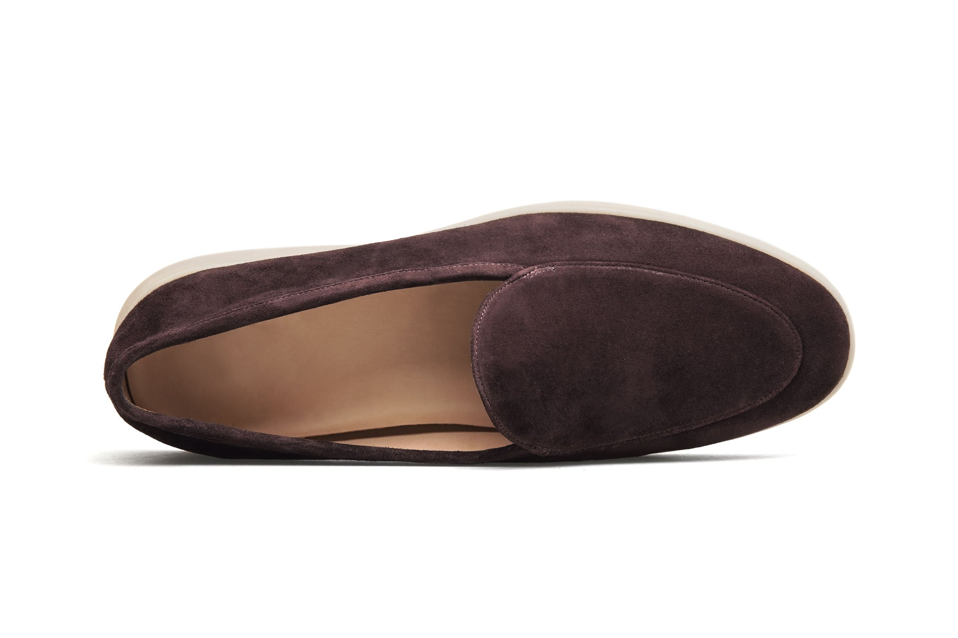 Men’s brown suede slip-on loafers with minimalist apron design and cream sole, perfect for smart-casual summer outfits.