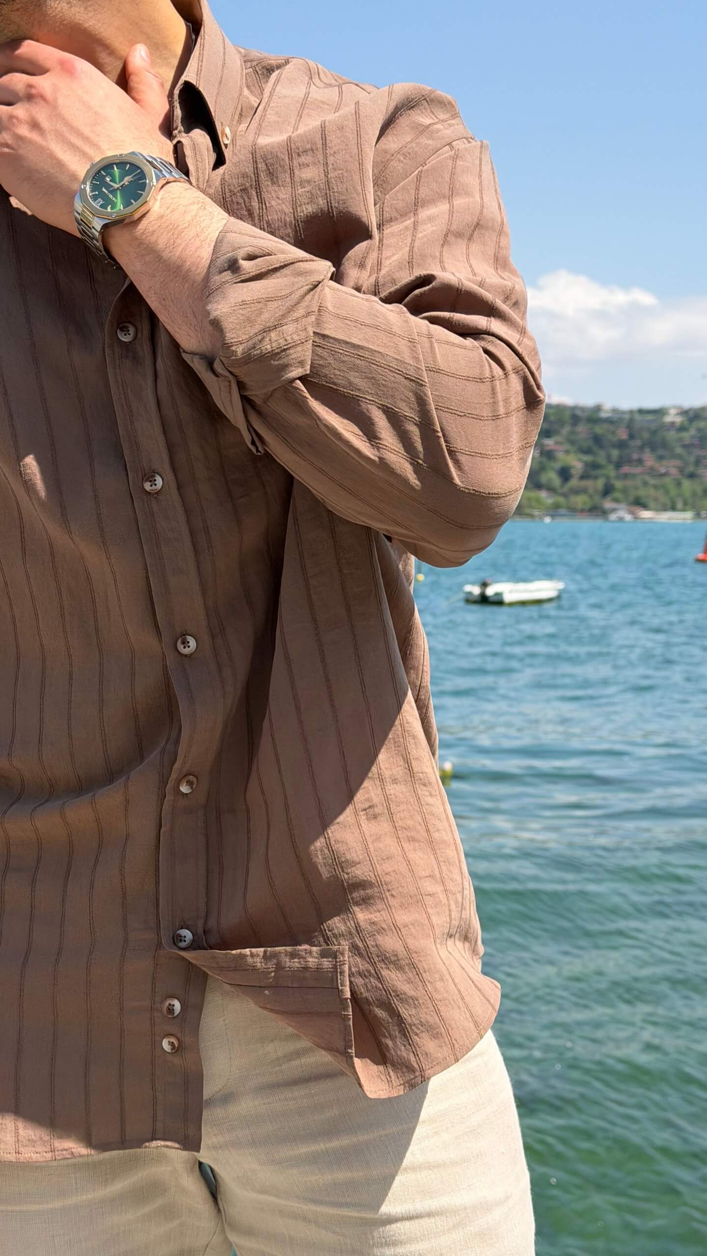 Men's brown vertical-striped shirt with button front, full-length view