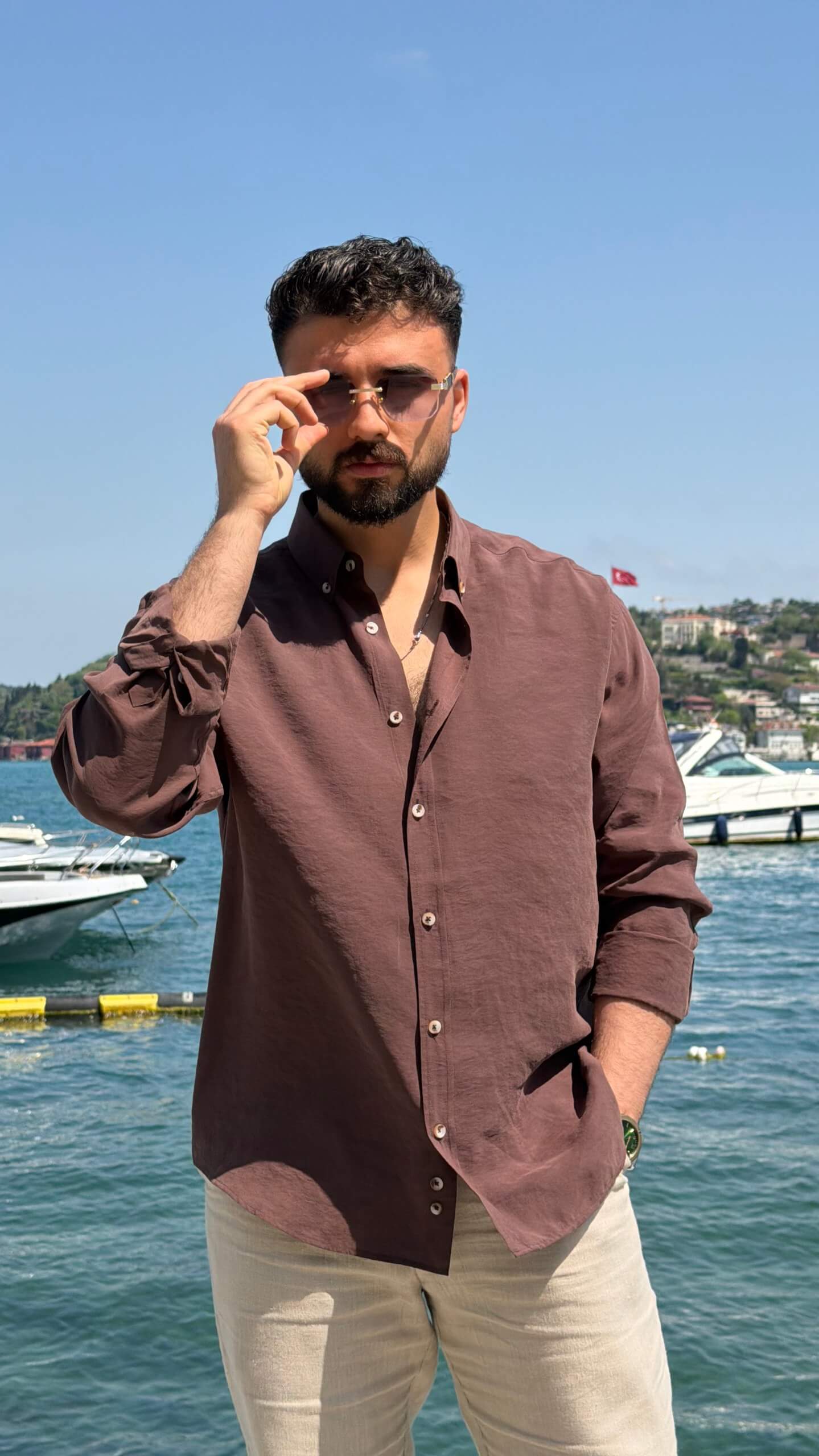 Brown vertical-striped men's shirt in relaxed oversized fit, front view