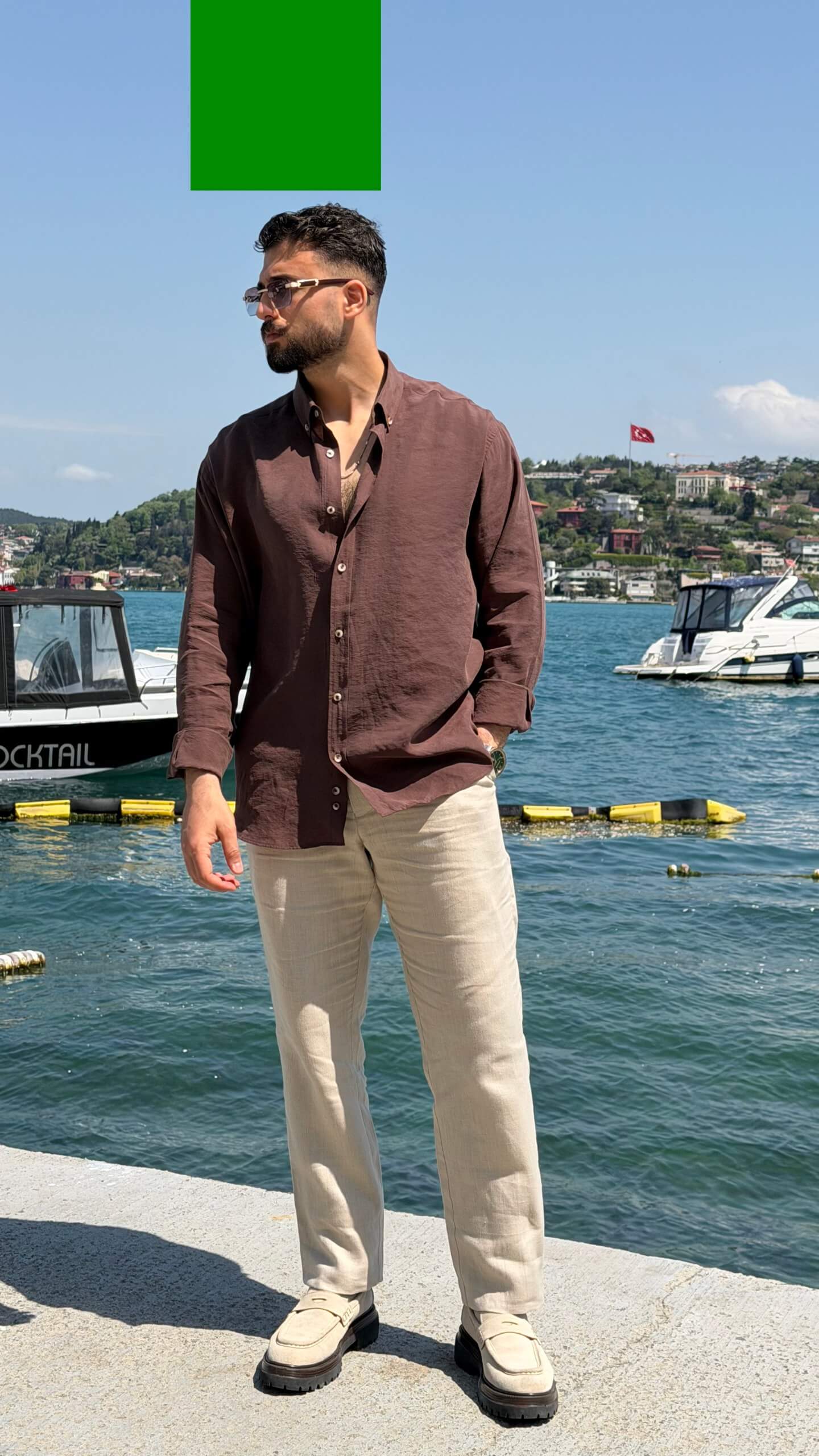 Brown vertical-striped relaxed-fit shirt, close-up of stripe pattern