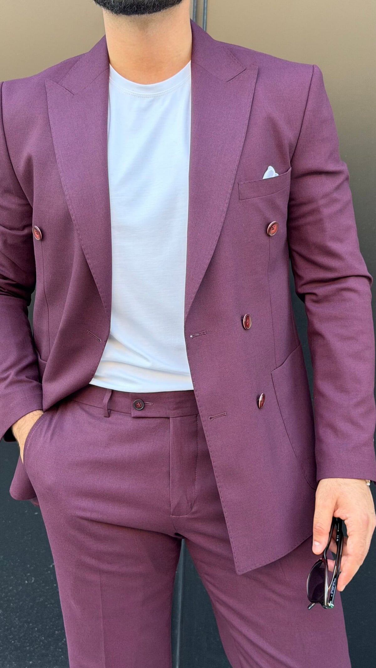 Men’s burgundy double breasted suit styled with white T-shirt for modern smart casual fashion