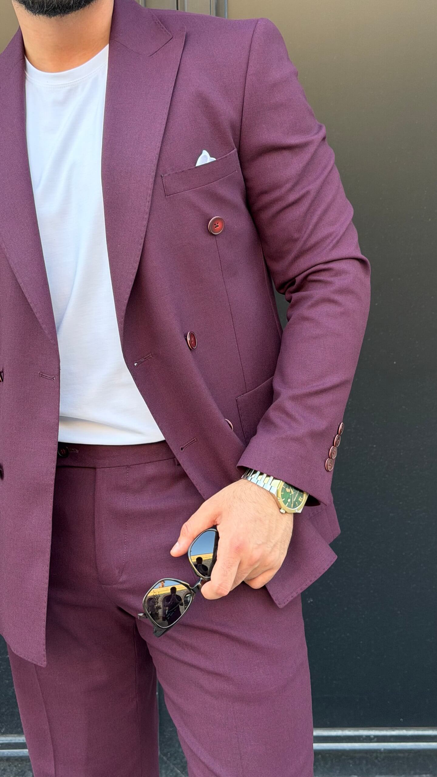 Men’s burgundy double breasted suit styled with white T-shirt for modern smart casual fashion