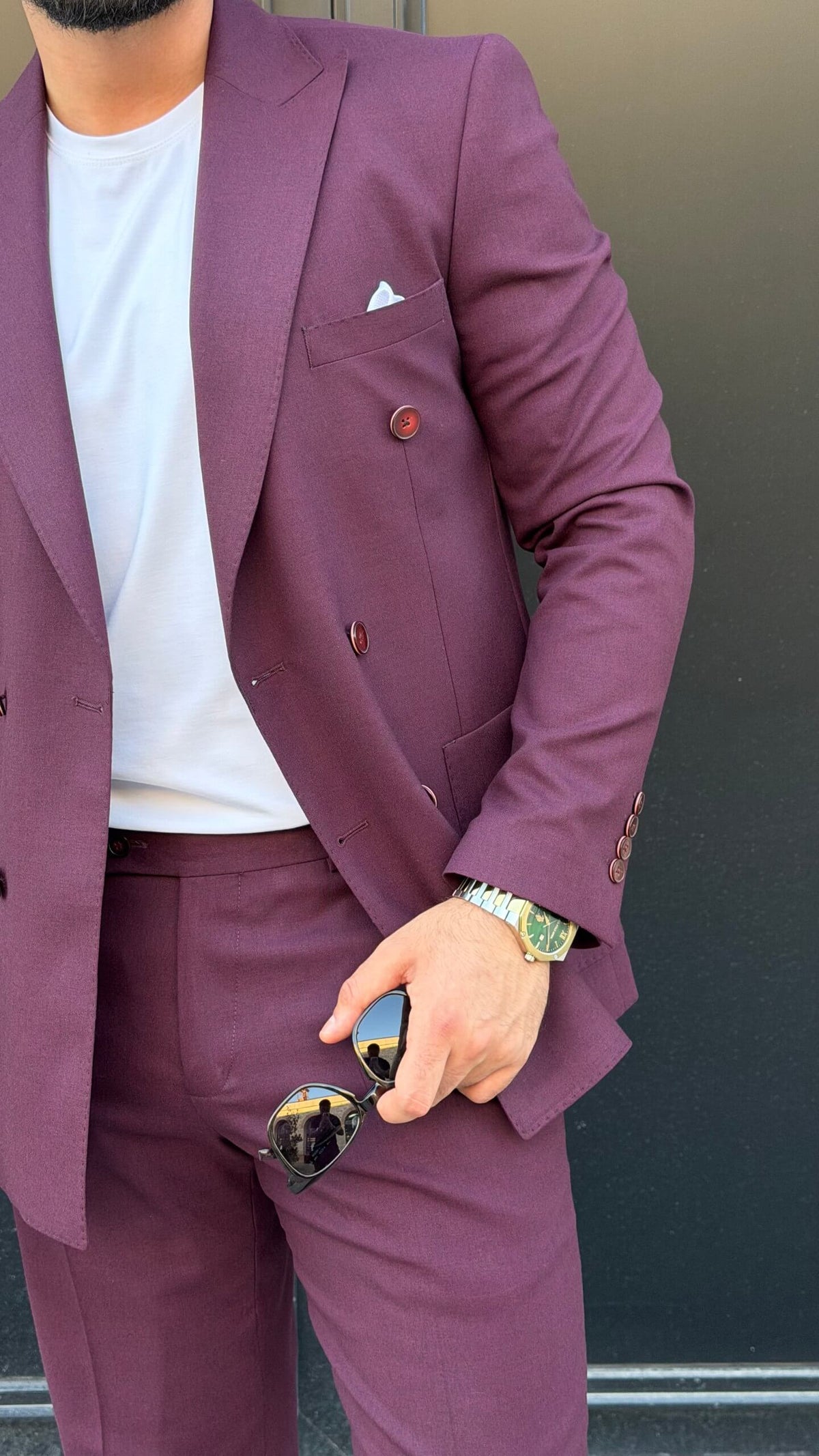 Men’s burgundy double breasted suit styled with white T-shirt for modern smart casual fashion