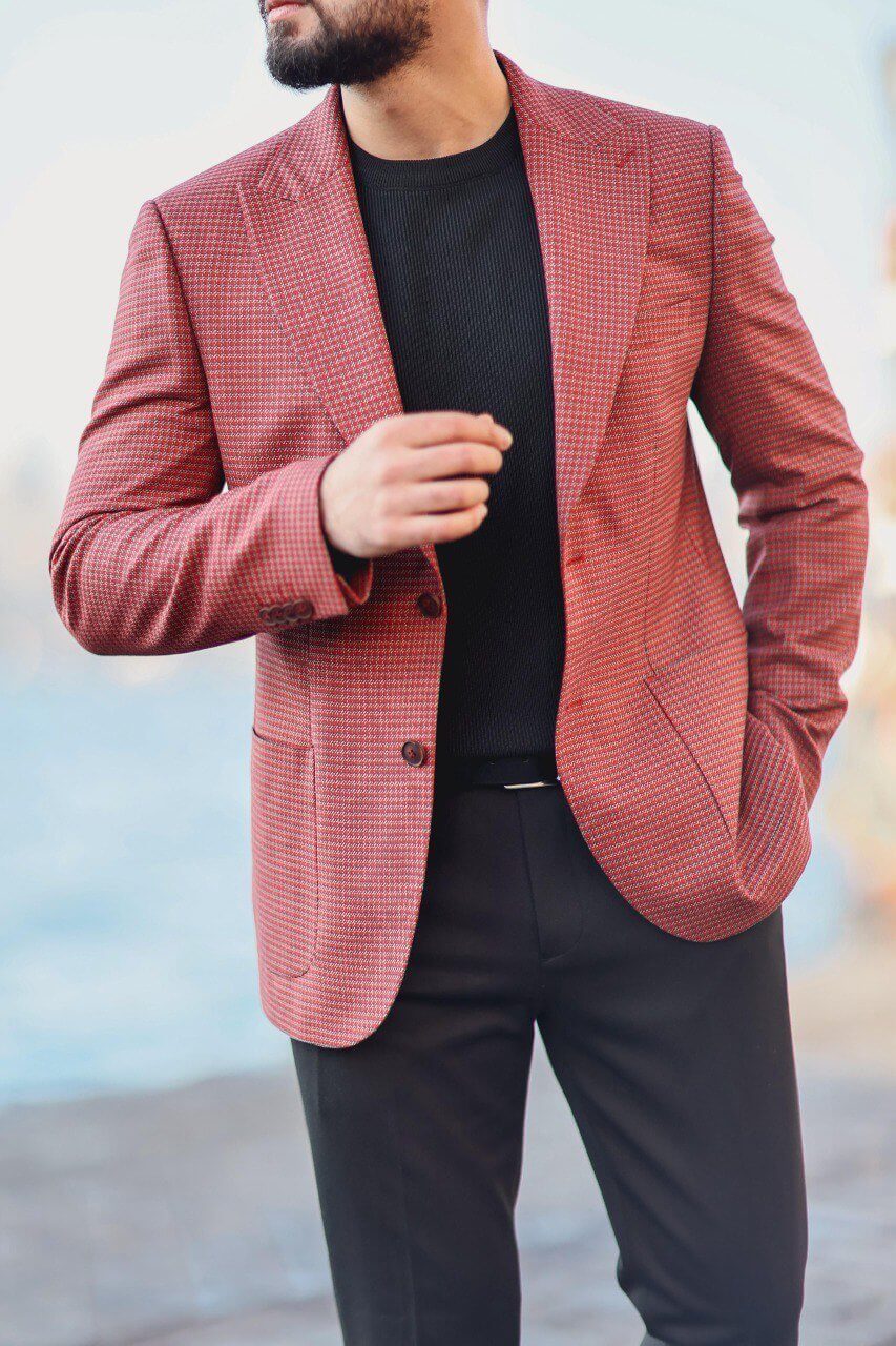 Men’s burgundy patterned slim-fit mono-collar jacket styled with black knit top