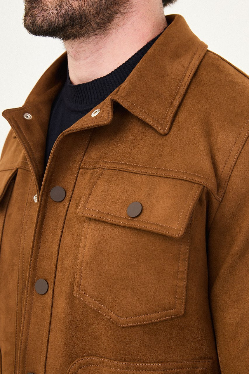 Men's camel suede-style jacket styled with a black sweater and dark trousers.