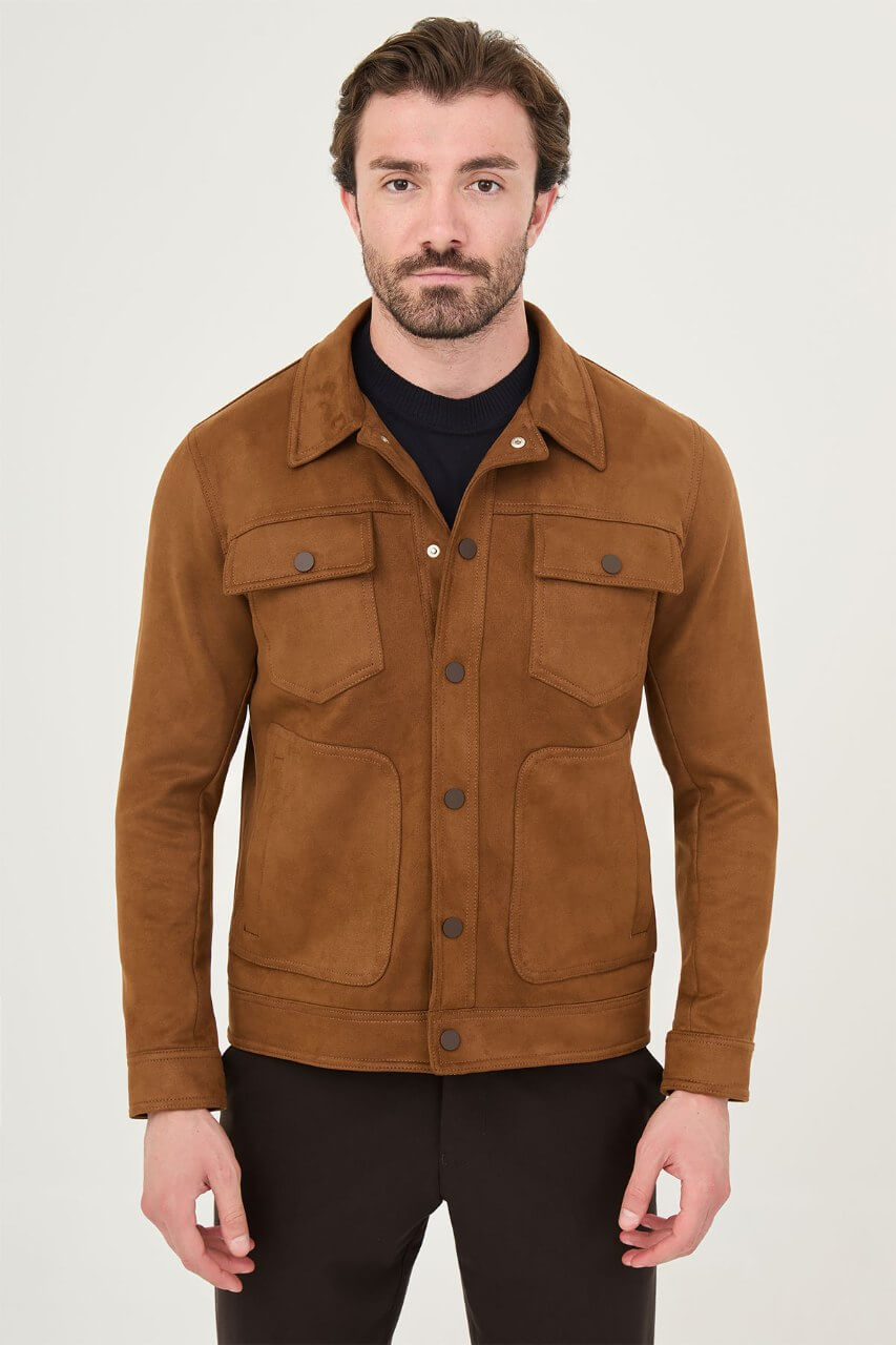 Men's camel suede-style jacket styled with a black sweater and dark trousers.