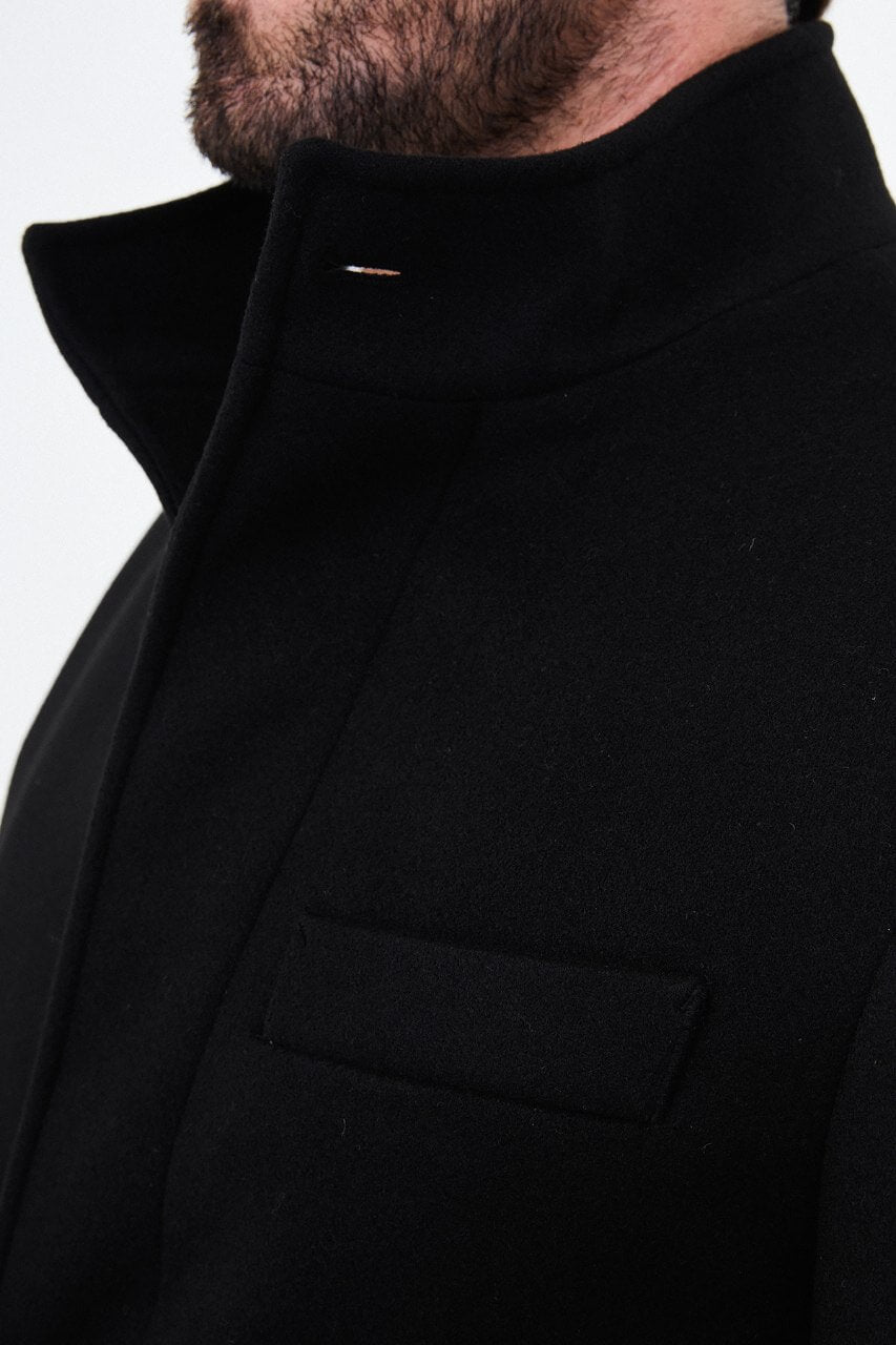 HolloMen black wool blend overcoat featuring a raised stand collar and button-front design.