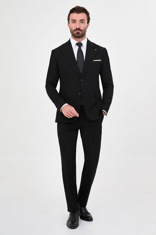 Men's black slim-fit two-piece suit featuring a tailored blazer, notch lapels and matching trousers.