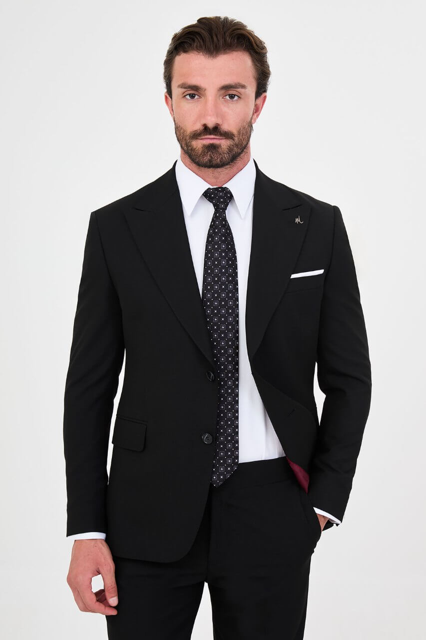 Men's black slim-fit two-piece suit featuring a tailored blazer, notch lapels and matching trousers.
