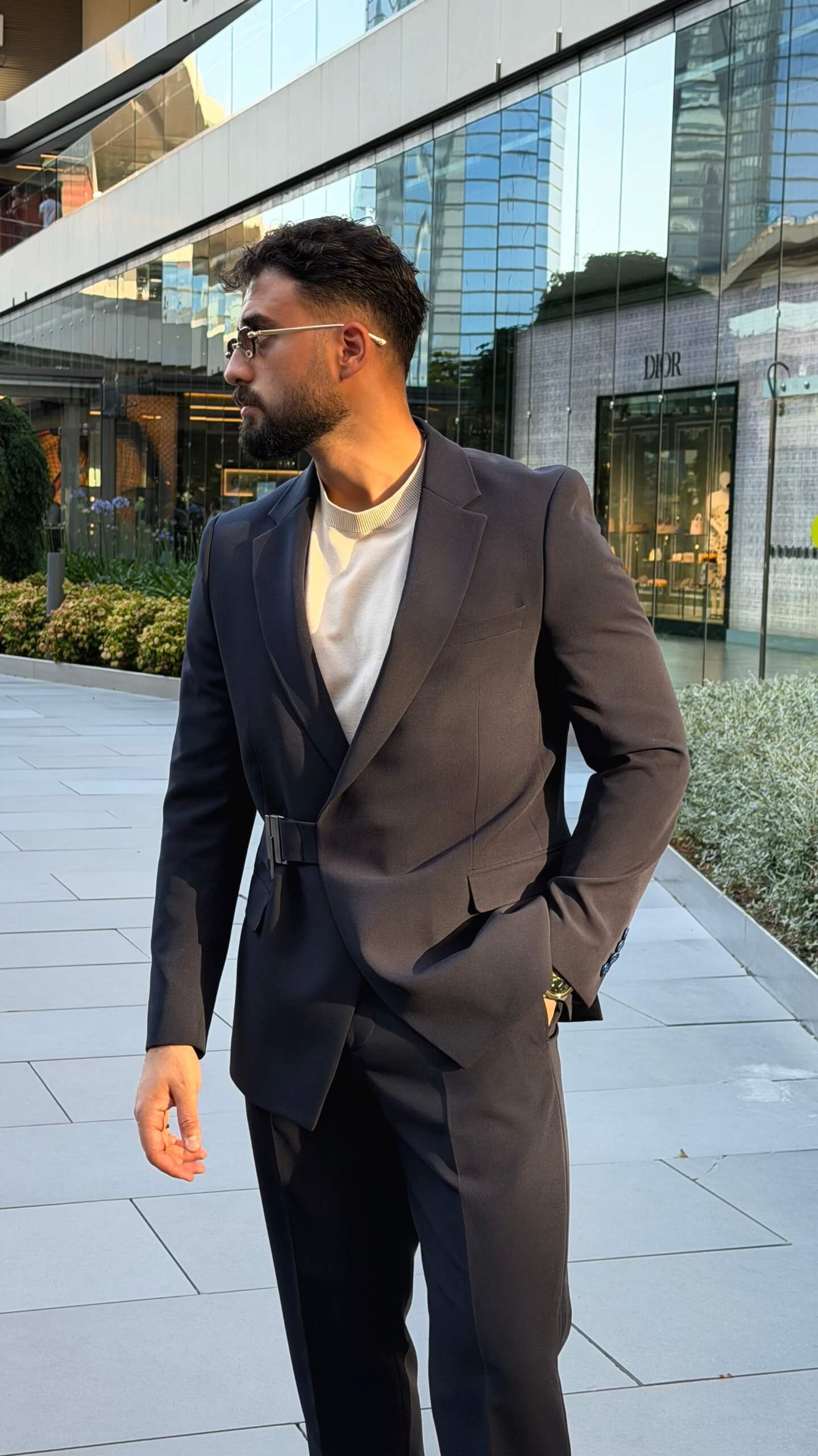 Men's navy blue single breasted suit with tailored jacket and trousers