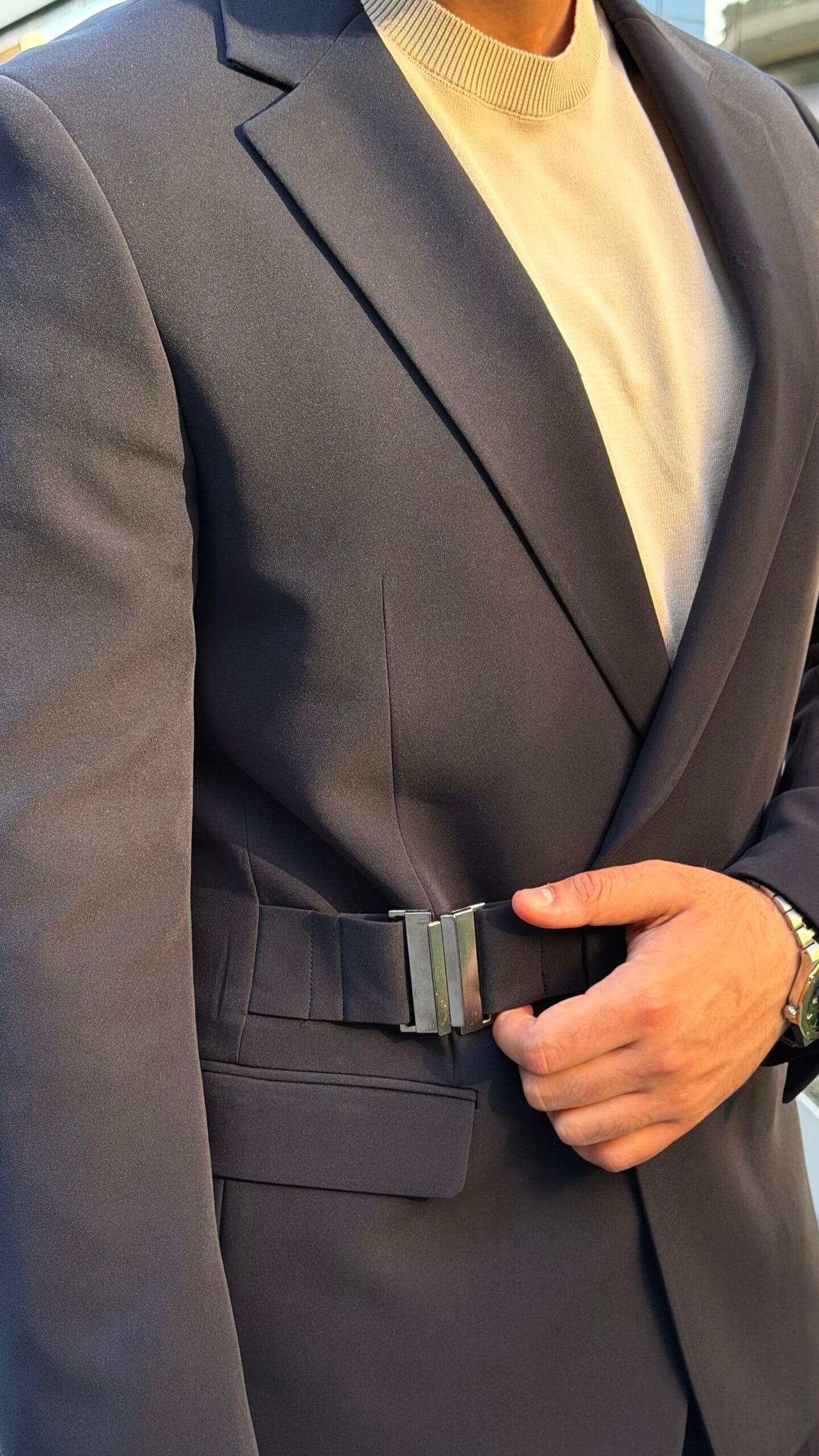 Men's navy blue single breasted suit with tailored jacket and trousers