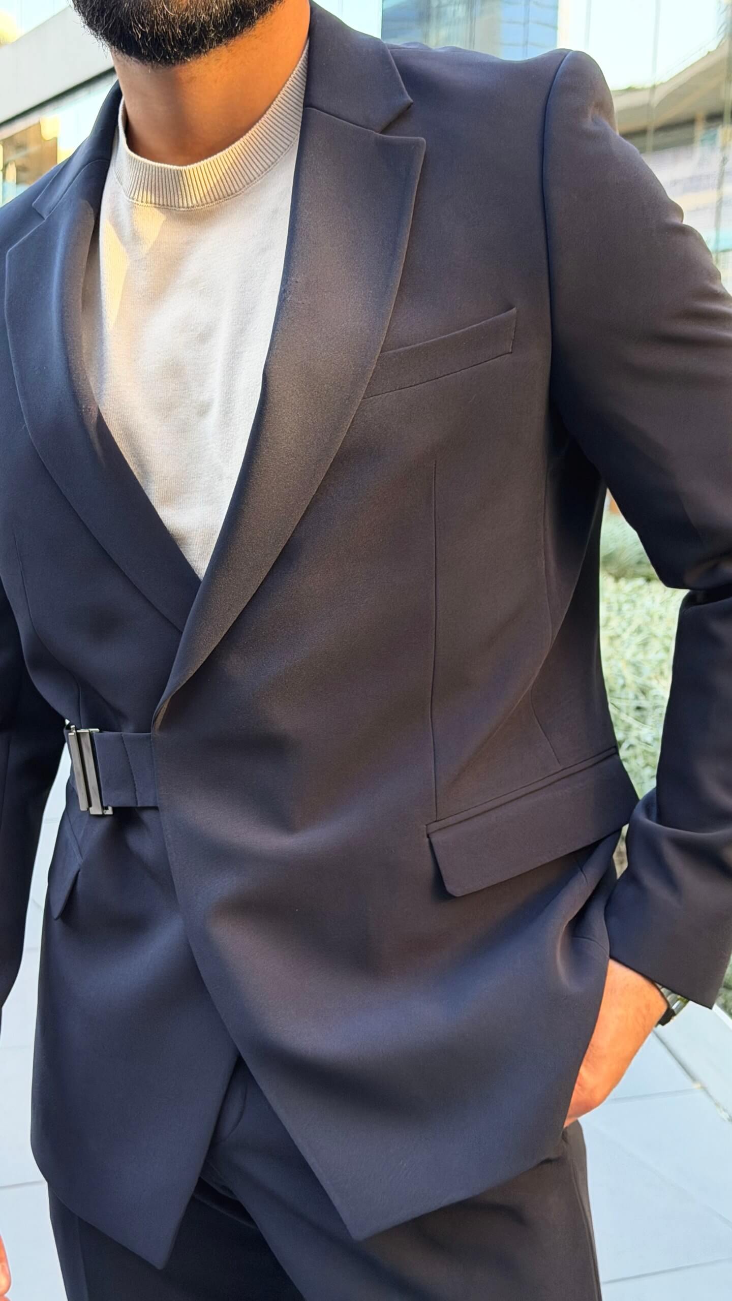 Men's navy blue single breasted suit with tailored jacket and trousers